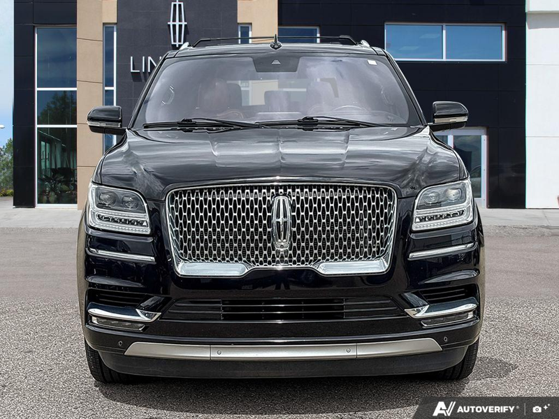 USED 2020 Lincoln Navigator Reserve - Infinite Black Metallic Exterior / RUSSET, HEATED/VENTILATED LUXURY LEATHER BUCKET SEATS Interior - $49,976 - Stock #E60140A - VIN 5LMJJ2LT4LEL14768 - Photo 2