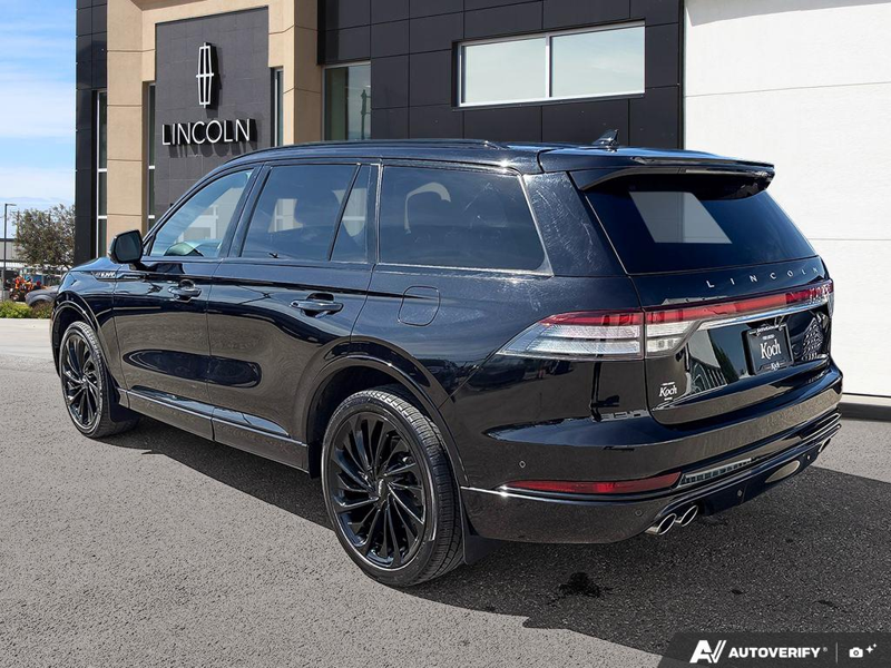 USED 2022 Lincoln Aviator Reserve - Infinite Black Metallic Exterior / ROAST, PREMIUM LEATHER HEATED/VENTILATED CAPTAIN'S CHAIRS Interior - $37,888 - Stock #E60697A - VIN 5LM5J7XC2NGL16955 - Photo 4