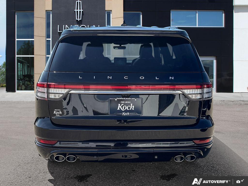 USED 2022 Lincoln Aviator Reserve - Infinite Black Metallic Exterior / ROAST, PREMIUM LEATHER HEATED/VENTILATED CAPTAIN'S CHAIRS Interior - $37,888 - Stock #E60697A - VIN 5LM5J7XC2NGL16955 - Photo 5