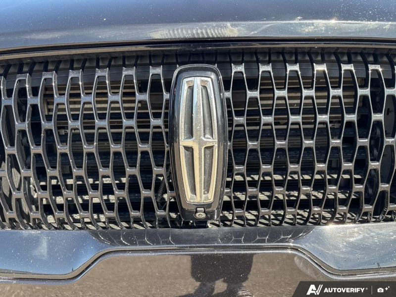 USED 2022 Lincoln Aviator Reserve - Infinite Black Metallic Exterior / ROAST, PREMIUM LEATHER HEATED/VENTILATED CAPTAIN'S CHAIRS Interior - $37,888 - Stock #E60697A - VIN 5LM5J7XC2NGL16955 - Photo 9