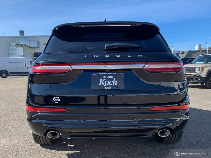 DEMO 2024 Lincoln Corsair Grand Touring - Infinite Black Metallic Exterior / EBONY/ETERNAL RED LEATHER TRIMMED Interior - $46,934 - Stock #E40219 - VIN 5LMTJ5DZ4RUL05161 - Photo 5