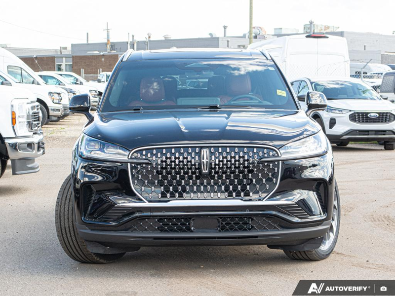 DEMO 2025 Lincoln Aviator Reserve - Infinite Black Metallic Exterior / HARVEST BRONZE LEATHER Interior - $79,984 - Stock #E51062 - VIN 5LM5J7XC2SGL27952 - Photo 2