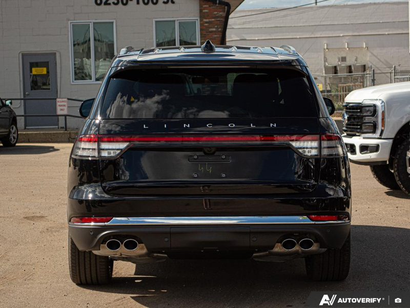 DEMO 2025 Lincoln Aviator Reserve - Infinite Black Metallic Exterior / HARVEST BRONZE LEATHER Interior - $79,984 - Stock #E51062 - VIN 5LM5J7XC2SGL27952 - Photo 5
