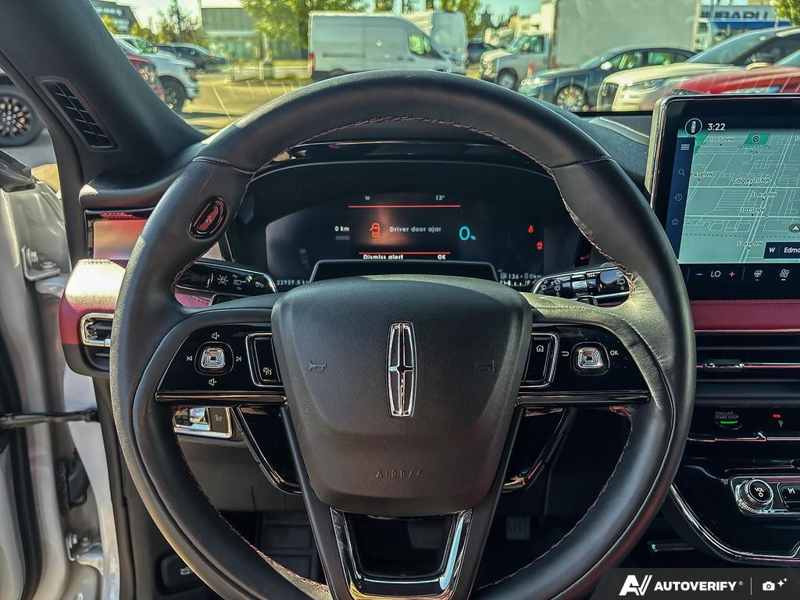 USED 2025 Lincoln Corsair Grand Touring - Crystal White Metallic Clearcoat Exterior / EBONY/ETERNAL RED, PREMIUM LEATHER-TRIMMED HEATED CAPTAIN'S CHAI Interior - $53,967 - Stock #EP4745 - VIN 5LMTJ5DZ8SUL12975 - Photo 14