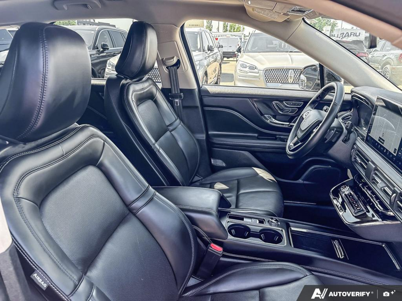 USED 2025 Lincoln Corsair Grand Touring - Infinite Black Metallic Clearcoat Exterior / EBONY, PREMIUM LEATHER-TRIMMED HEATED CAPTAIN'S CHAIRS Interior - $50,908 - Stock #EP4719 - VIN 5LMTJ5DZ1SUL12154 - Photo 22