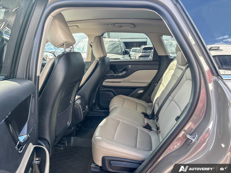 USED 2025 Lincoln Corsair Grand Touring - Harbor Gray Met Cc Exterior / LIGHT SMOKED TRUFFLE, PREMIUM LEATHER-TRIMMED HEATED CAPTAIN'S C Interior - $53,604 - Stock #EP4776 - VIN 5LMTJ5DZ9SUL02410 - Photo 23