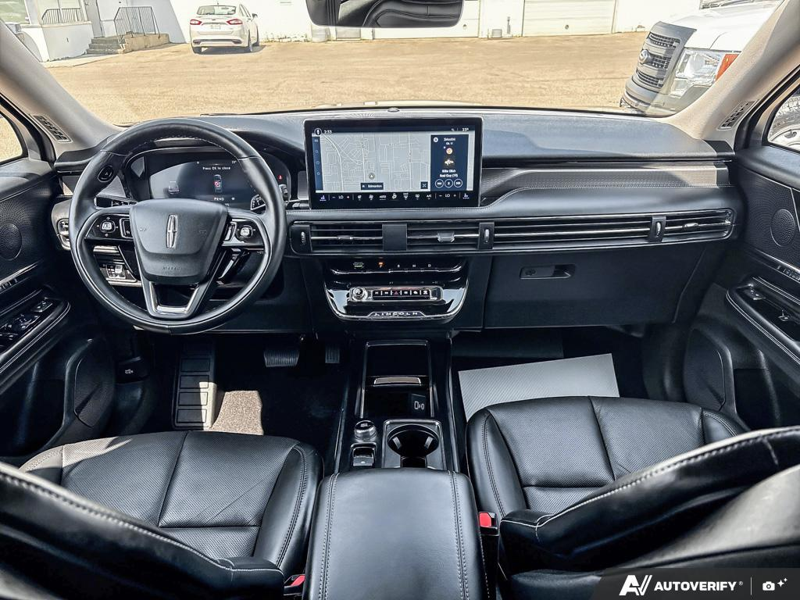 USED 2025 Lincoln Corsair Grand Touring - Infinite Black Metallic Clearcoat Exterior / EBONY, PREMIUM LEATHER-TRIMMED HEATED CAPTAIN'S CHAIRS Interior - $50,908 - Stock #EP4719 - VIN 5LMTJ5DZ1SUL12154 - Photo 24