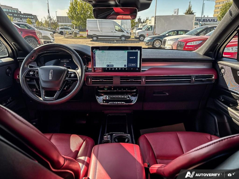 USED 2025 Lincoln Corsair Grand Touring - Crystal White Metallic Clearcoat Exterior / EBONY/ETERNAL RED, PREMIUM LEATHER-TRIMMED HEATED CAPTAIN'S CHAI Interior - $53,967 - Stock #EP4745 - VIN 5LMTJ5DZ8SUL12975 - Photo 24
