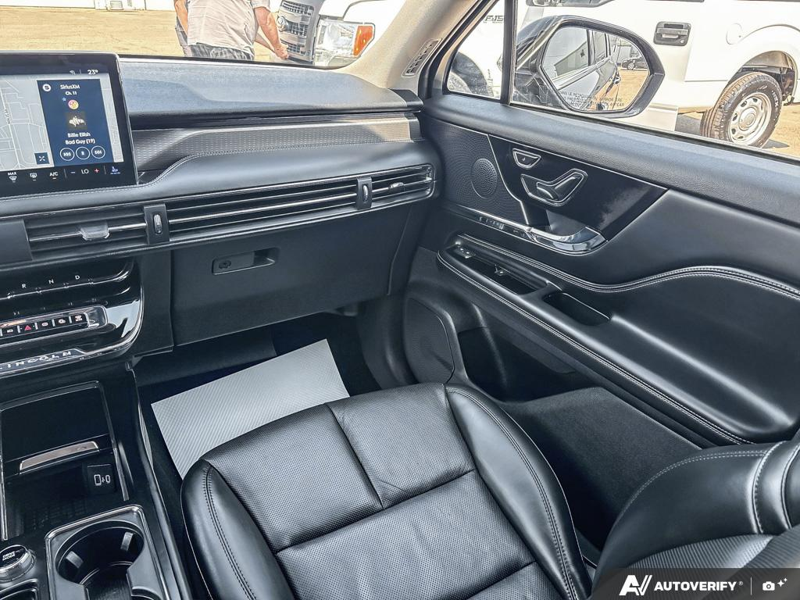 USED 2025 Lincoln Corsair Grand Touring - Infinite Black Metallic Clearcoat Exterior / EBONY, PREMIUM LEATHER-TRIMMED HEATED CAPTAIN'S CHAIRS Interior - $50,908 - Stock #EP4719 - VIN 5LMTJ5DZ1SUL12154 - Photo 25