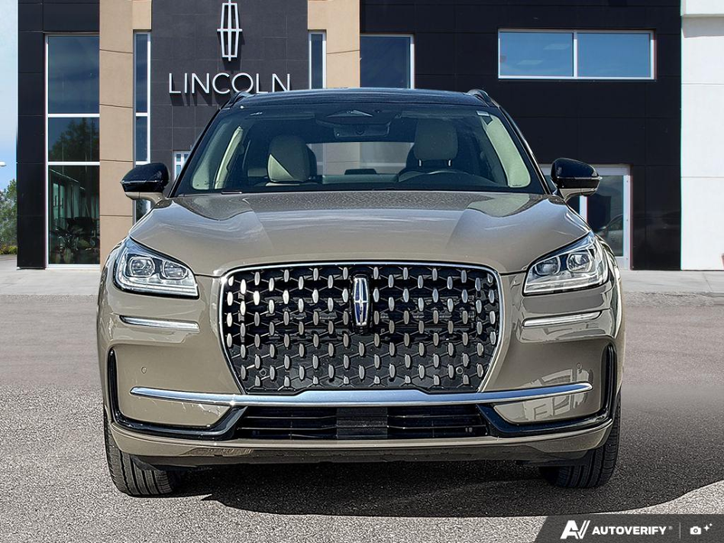 USED 2025 Lincoln Corsair Grand Touring - Harbor Gray Met Cc Exterior / LIGHT SMOKED TRUFFLE, PREMIUM LEATHER-TRIMMED HEATED CAPTAIN'S C Interior - $53,604 - Stock #EP4776 - VIN 5LMTJ5DZ9SUL02410 - Photo 2