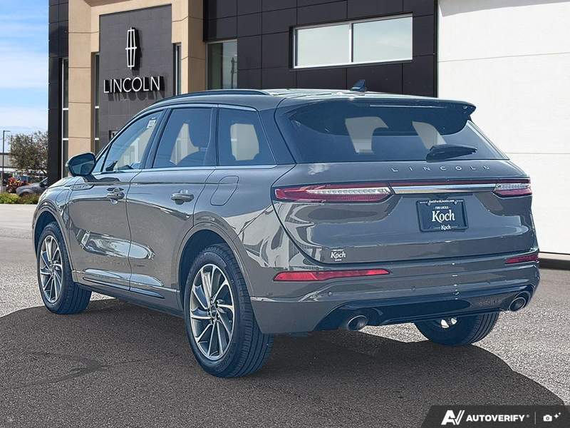 USED 2025 Lincoln Corsair Grand Touring - Harbor Gray Met Cc Exterior / LIGHT SMOKED TRUFFLE, PREMIUM LEATHER-TRIMMED HEATED CAPTAIN'S C Interior - $53,604 - Stock #EP4776 - VIN 5LMTJ5DZ9SUL02410 - Photo 4