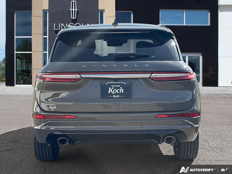 USED 2025 Lincoln Corsair Grand Touring - Harbor Gray Met Cc Exterior / LIGHT SMOKED TRUFFLE, PREMIUM LEATHER-TRIMMED HEATED CAPTAIN'S C Interior - $53,604 - Stock #EP4776 - VIN 5LMTJ5DZ9SUL02410 - Photo 5