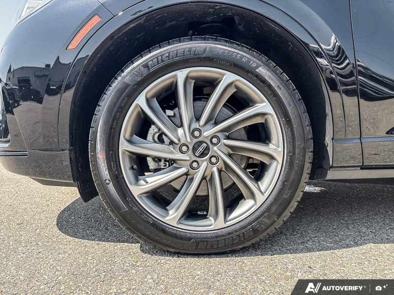USED 2025 Lincoln Corsair Grand Touring - Infinite Black Metallic Clearcoat Exterior / EBONY, PREMIUM LEATHER-TRIMMED HEATED CAPTAIN'S CHAIRS Interior - $50,908 - Stock #EP4719 - VIN 5LMTJ5DZ1SUL12154 - Photo 6