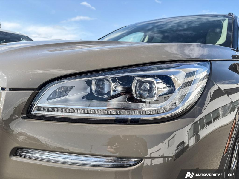 USED 2025 Lincoln Corsair Grand Touring - Harbor Gray Met Cc Exterior / LIGHT SMOKED TRUFFLE, PREMIUM LEATHER-TRIMMED HEATED CAPTAIN'S C Interior - $53,604 - Stock #EP4776 - VIN 5LMTJ5DZ9SUL02410 - Photo 8