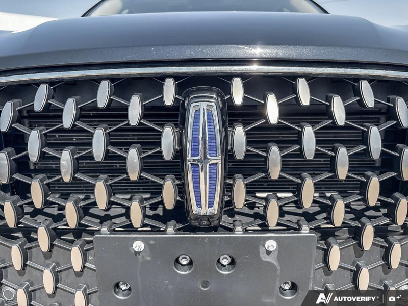USED 2025 Lincoln Corsair Grand Touring - Infinite Black Metallic Clearcoat Exterior / EBONY, PREMIUM LEATHER-TRIMMED HEATED CAPTAIN'S CHAIRS Interior - $50,908 - Stock #EP4719 - VIN 5LMTJ5DZ1SUL12154 - Photo 9