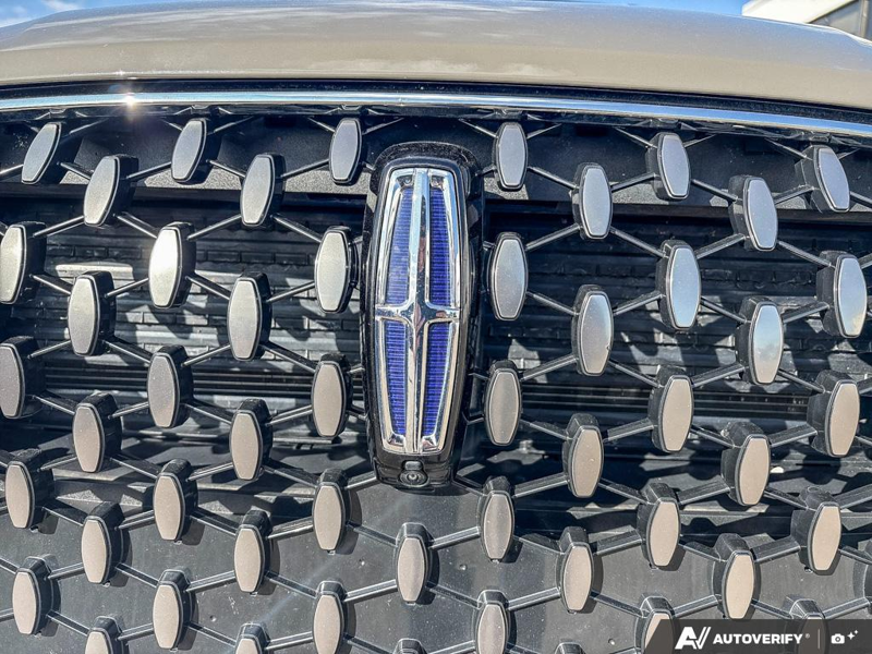 USED 2025 Lincoln Corsair Grand Touring - Harbor Gray Met Cc Exterior / LIGHT SMOKED TRUFFLE, PREMIUM LEATHER-TRIMMED HEATED CAPTAIN'S C Interior - $53,604 - Stock #EP4776 - VIN 5LMTJ5DZ9SUL02410 - Photo 9