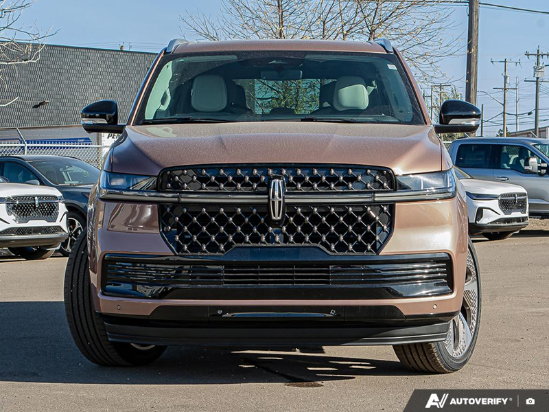 NEW 2025 Lincoln Navigator L Black Label - Sunrise Copper Metallic Pc Exterior / SALT CRYSTAL GRAY W/ADOBE, AUTO HTD & VENTILATED OPULENCE LTHR C Interior - $145,919 - Stock #E51307 - VIN 5LMJJ3TG7SEL18675 - Photo 2