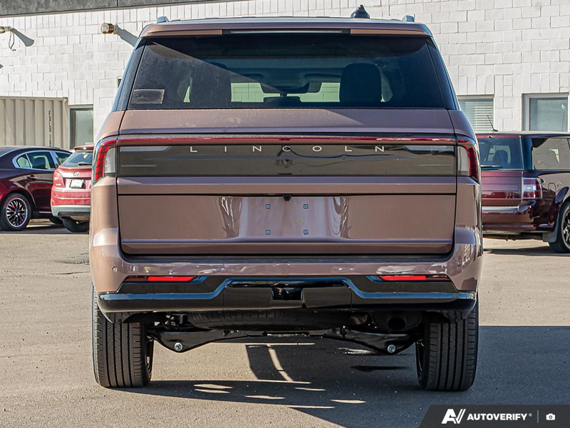 NEW 2025 Lincoln Navigator L Black Label - Sunrise Copper Metallic Pc Exterior / SALT CRYSTAL GRAY W/ADOBE, AUTO HTD & VENTILATED OPULENCE LTHR C Interior - $145,919 - Stock #E51307 - VIN 5LMJJ3TG7SEL18675 - Photo 5