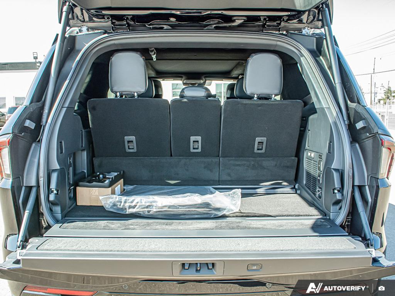 NEW 2025 Lincoln Navigator Black Label - Infinite Black Metallic Exterior / BLK ONYX W/BRANDY STITCH, AUTO HTD & VENTILATED OPULENCE LTHR CA Interior - $138,814 - Stock #E51212 - VIN 5LMJJ2TG0SEL15613 - Photo 11