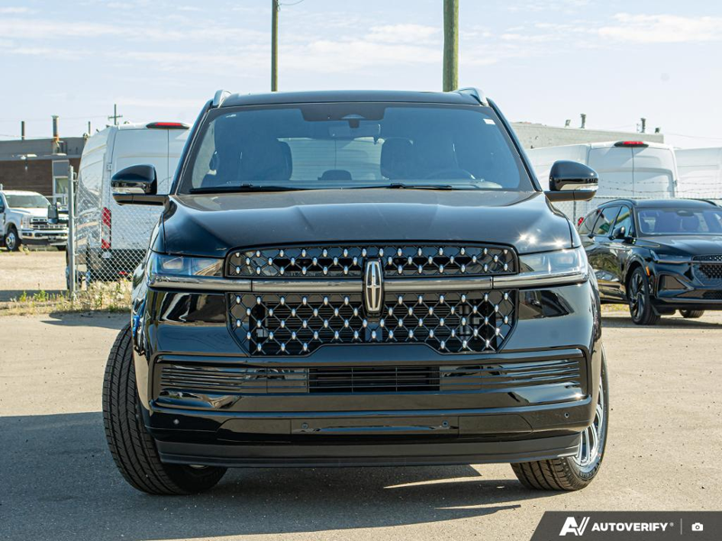NEW 2025 Lincoln Navigator Black Label - Infinite Black Metallic Exterior / BLK ONYX W/BRANDY STITCH, AUTO HTD & VENTILATED OPULENCE LTHR CA Interior - $138,814 - Stock #E51212 - VIN 5LMJJ2TG0SEL15613 - Photo 2