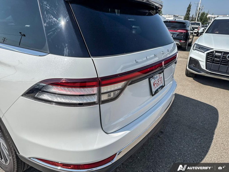 DEMO 2026 Lincoln Aviator Premiere - Pristine White Metallic Tri-coat Exterior / LIGHT SPACE GRAY Interior - $79,216 - Stock #E60358 - VIN 5LM5J6XC7TGL12813 - Photo 11