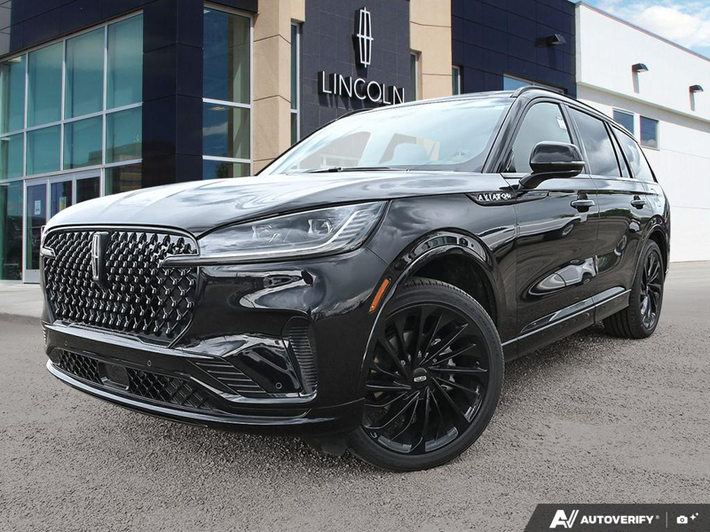 NEW 2026 Lincoln Aviator Reserve - Infinite Black Metallic Exterior / HARVEST BRONZE LEATHER Interior - $101,644 - Stock #E60697 - VIN 5LM5J7XC2TGL19108 - Photo 1