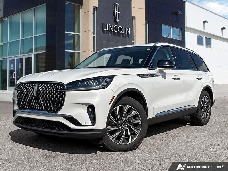 DEMO 2026 Lincoln Aviator Premiere - Pristine White Metallic Tri-coat Exterior / LIGHT SPACE GRAY Interior - $79,216 - Stock #E60358 - VIN 5LM5J6XC7TGL12813 - Photo 1