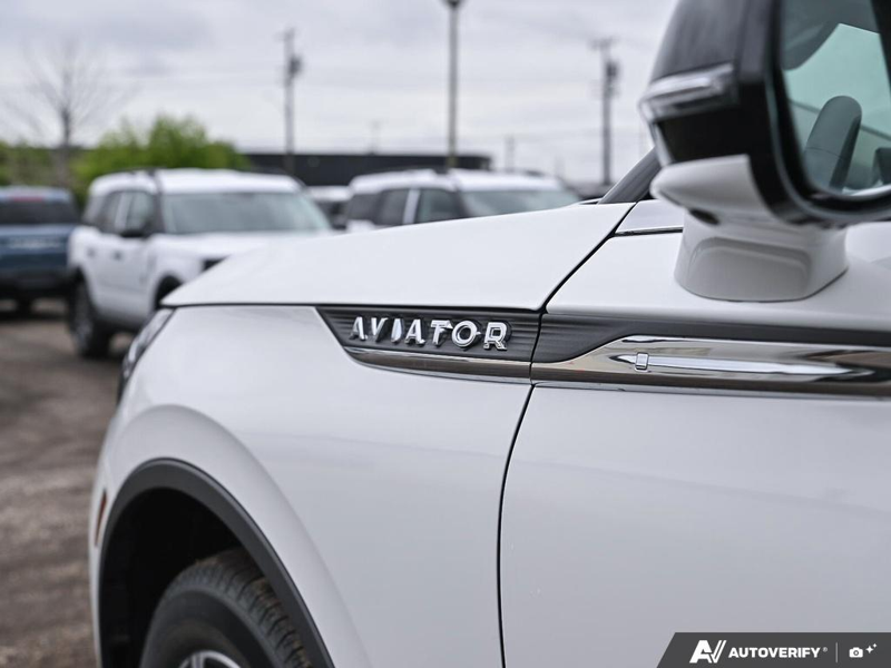 NEW 2026 Lincoln Aviator Premiere - Pristine White Metallic Tri-coat Exterior / ONYX, LINCOLN SOFT TOUCH HEATED/VENTILATED COMFORT SEATS Interior - $77,826 - Stock #E60669 - VIN 5LM5J6XC0TGL17402 - Photo 27