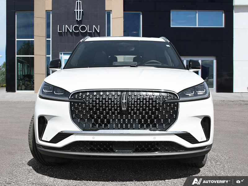 NEW 2026 Lincoln Aviator Reserve - Pristine White Metallic Tri-coat Exterior / HOT CHOCOLATE PREM LTHR Interior - $89,469 - Stock #E60796 - VIN 5LM5J7XC6TGL18446 - Photo 2