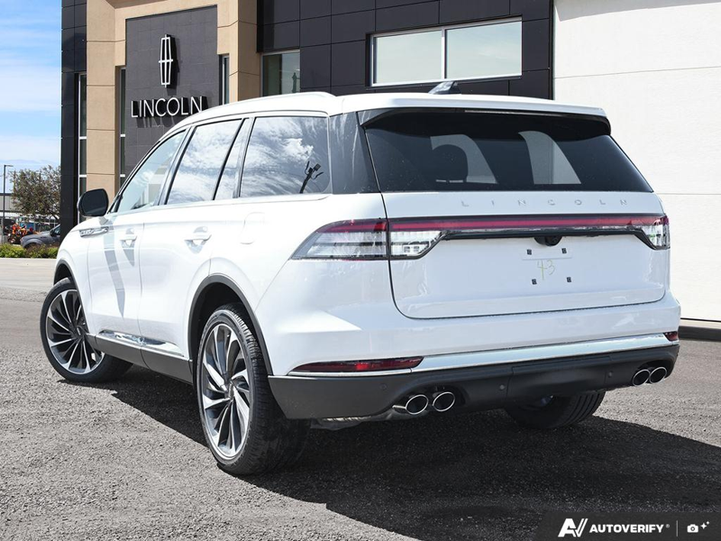 NEW 2026 Lincoln Aviator Reserve - Pristine White Metallic Tri-coat Exterior / HOT CHOCOLATE PREM LTHR Interior - $89,469 - Stock #E60796 - VIN 5LM5J7XC6TGL18446 - Photo 4
