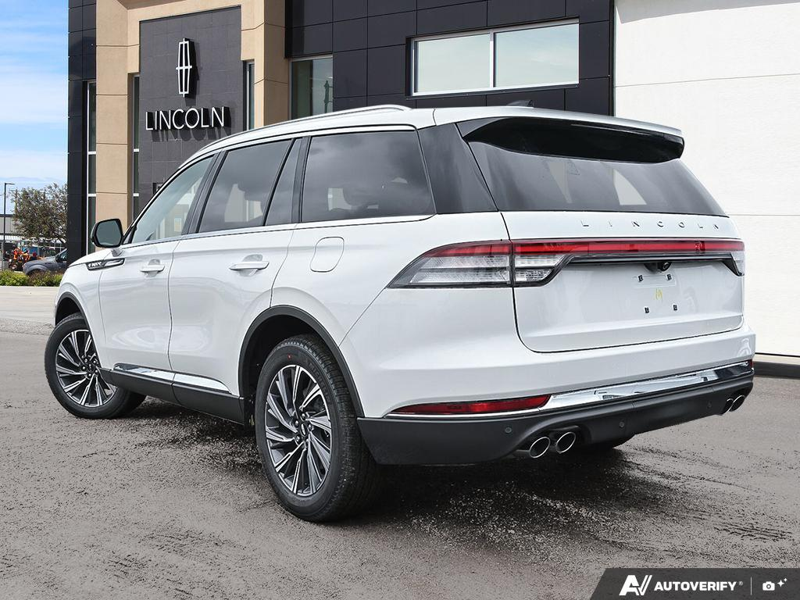 NEW 2026 Lincoln Aviator Premiere - Pristine White Metallic Tri-coat Exterior / ONYX, LINCOLN SOFT TOUCH HEATED/VENTILATED COMFORT SEATS Interior - $77,826 - Stock #E60669 - VIN 5LM5J6XC0TGL17402 - Photo 4