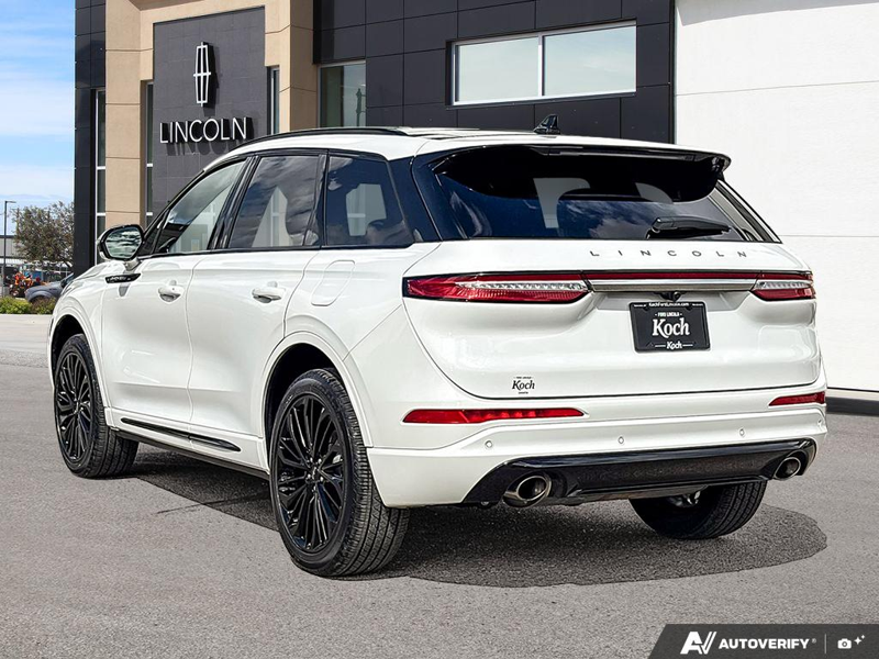 USED 2026 Lincoln Corsair Reserve - Pristine White Metallic Tri-coat Exterior / EBONY/ETERNAL RED, PREMIUM LEATHER-TRIMMED HEATED/VENTILATED CAP Interior - $63,976 - Stock #EP4740 - VIN 5LMCJ2DA2TUL00119 - Photo 4