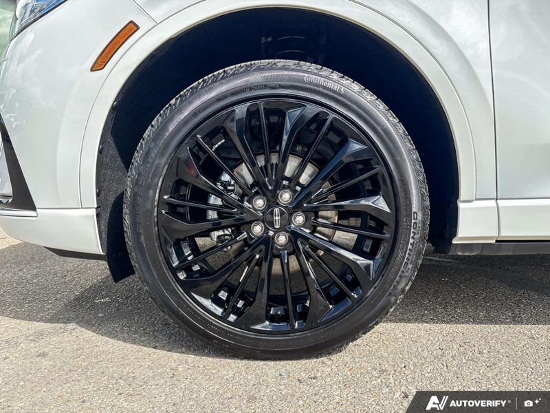 USED 2026 Lincoln Corsair Reserve - Pristine White Metallic Tri-coat Exterior / EBONY/ETERNAL RED, PREMIUM LEATHER-TRIMMED HEATED/VENTILATED CAP Interior - $63,976 - Stock #EP4740 - VIN 5LMCJ2DA2TUL00119 - Photo 6