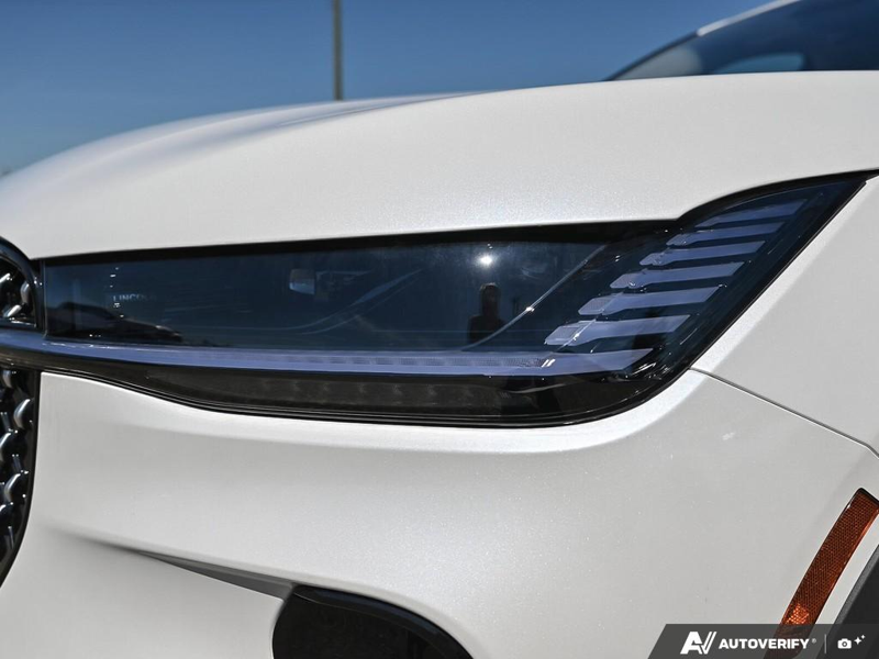 NEW 2026 Lincoln Nautilus Premiere - White Platinum Metallic Tri-coat Exterior / ONYX BLACK, LINCOLN SOFT TOUCH HEATED FRONT CAPTAIN'S CHAIRS Interior - $58,409 - Stock #E60478 - VIN 5LMPJ8JA0TJ038837 - Photo 10