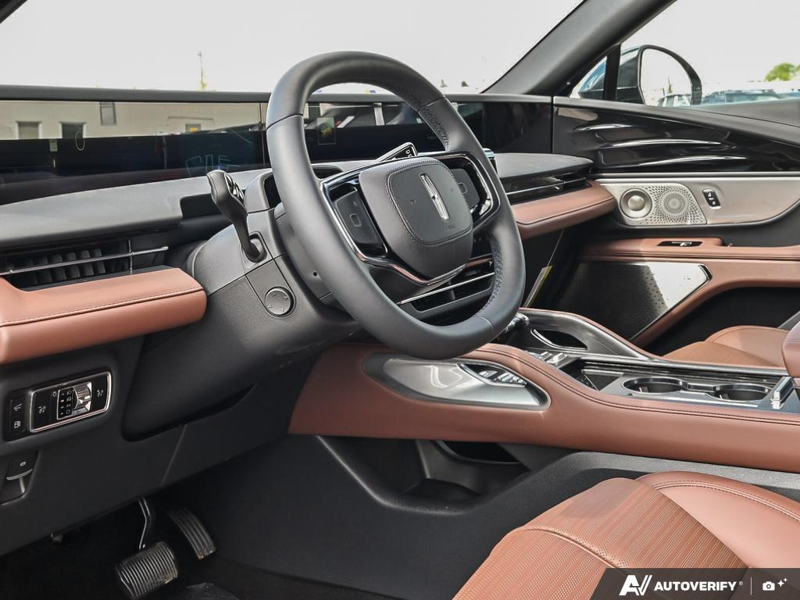 NEW 2026 Lincoln Nautilus Reserve Hybrid - Infinite Black Metallic Clearcoat Exterior / HOT CHOCOLATE, PREMIUM LEATHER-TRIMMED HEAT/VENT CAPTAIN'S CHAIR Interior - $83,586 - Stock #E61028 - VIN 5LMPJ8K49TJ064653 - Photo 13