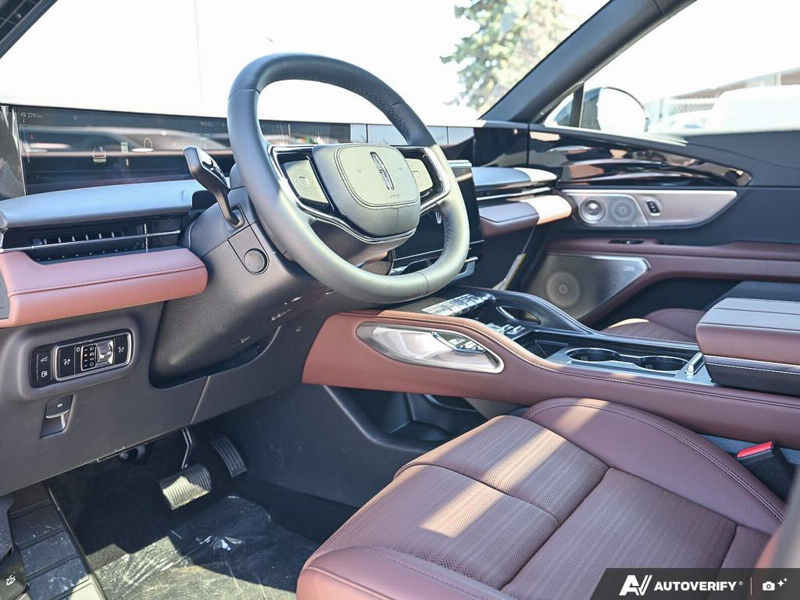 NEW 2026 Lincoln Nautilus Reserve Hybrid - White Platinum Metallic Tri-coat Exterior / HOT CHOCOLATE, PREMIUM LEATHER-TRIMMED HEAT/VENT CAPTAIN'S CHAIR Interior - $84,409 - Stock #E61034 - VIN 5LMPJ8K43TJ066804 - Photo 13