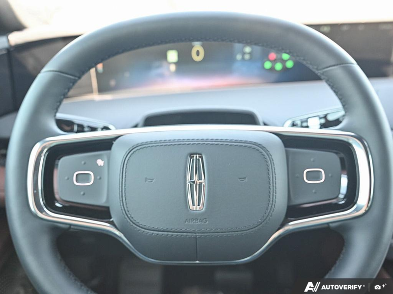NEW 2026 Lincoln Nautilus Reserve Hybrid - Whisper Blue Metallic Clearcoat Exterior / HOT CHOCOLATE, PREMIUM LEATHER-TRIMMED HEAT/VENT CAPTAIN'S CHAIR Interior - $84,409 - Stock #E61035 - VIN 5LMPJ8K41TJ066803 - Photo 14