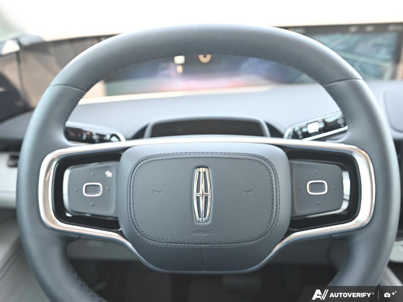 DEMO 2026 Lincoln Nautilus Premiere - Silver Radiance Exterior / MEDIUM LIGHT SPACE GRAY, LINCOLN SOFT TOUCH HEATED FRONT CAPTAIN Interior - $53,884 - Stock #E60739 - VIN 5LMPJ8JA1TJ051743 - Photo 14
