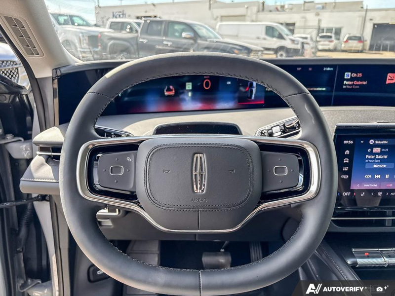 DEMO 2026 Lincoln Nautilus Premiere - Gray Matter Met Cc Exterior / ONYX BLACK, LINCOLN SOFT TOUCH HEATED FRONT CAPTAIN'S CHAIRS Interior - $60,284 - Stock #E60741 - VIN 5LMPJ8JA5TJ052054 - Photo 14
