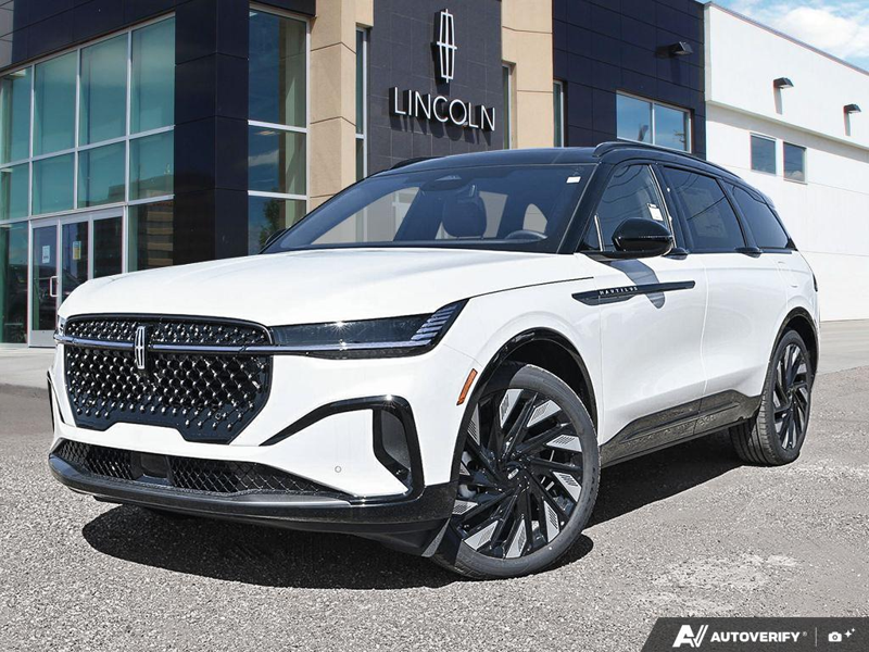 NEW 2026 Lincoln Nautilus Reserve Hybrid - White Platinum Metallic Tri-coat Exterior / HOT CHOCOLATE, PREMIUM LEATHER-TRIMMED HEAT/VENT CAPTAIN'S CHAIR Interior - $84,409 - Stock #E61034 - VIN 5LMPJ8K43TJ066804 - Photo 1