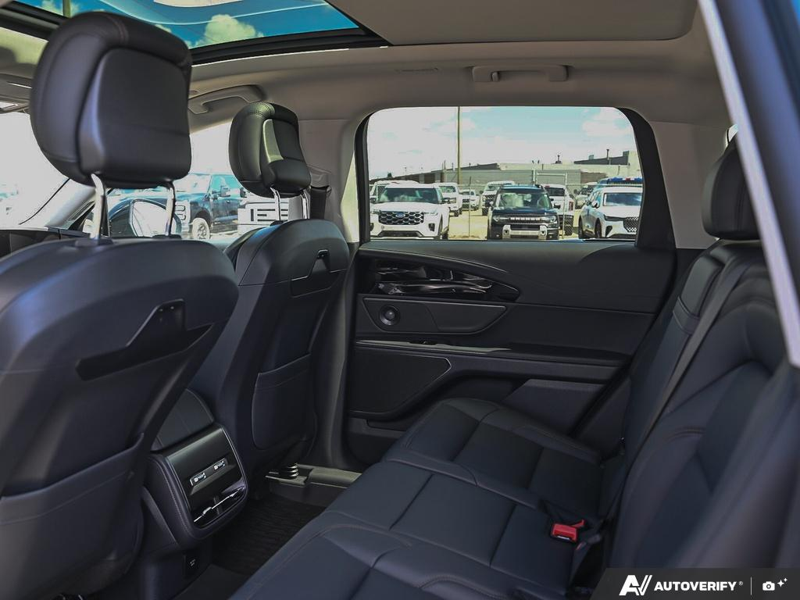 NEW 2026 Lincoln Nautilus Premiere - Whisper Blue Metallic Clearcoat Exterior / ONYX BLACK, LINCOLN SOFT TOUCH HEATED FRONT CAPTAIN'S CHAIRS Interior - $67,184 - Stock #E60726 - VIN 5LMPJ8JA9TJ049688 - Photo 23