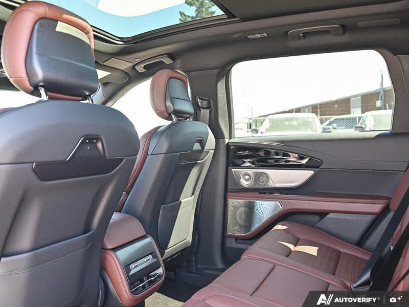 NEW 2026 Lincoln Nautilus Reserve Hybrid - White Platinum Metallic Tri-coat Exterior / HOT CHOCOLATE, PREMIUM LEATHER-TRIMMED HEAT/VENT CAPTAIN'S CHAIR Interior - $84,409 - Stock #E61034 - VIN 5LMPJ8K43TJ066804 - Photo 23