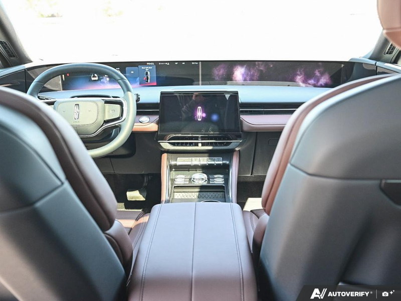 NEW 2026 Lincoln Nautilus Reserve Hybrid - White Platinum Metallic Tri-coat Exterior / HOT CHOCOLATE, PREMIUM LEATHER-TRIMMED HEAT/VENT CAPTAIN'S CHAIR Interior - $84,409 - Stock #E61034 - VIN 5LMPJ8K43TJ066804 - Photo 24