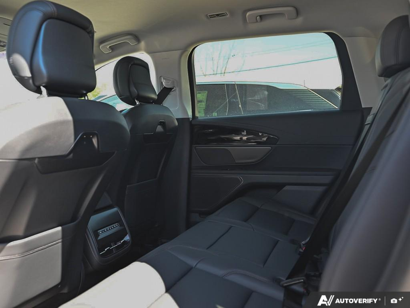 NEW 2026 Lincoln Nautilus Premiere - White Platinum Metallic Tri-coat Exterior / ONYX BLACK, LINCOLN SOFT TOUCH HEATED FRONT CAPTAIN'S CHAIRS Interior - $58,409 - Stock #E60478 - VIN 5LMPJ8JA0TJ038837 - Photo 24