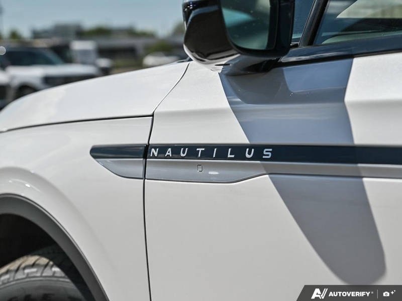 NEW 2026 Lincoln Nautilus Premiere - White Platinum Metallic Tri-coat Exterior / MEDIUM LIGHT SPACE GRAY, LINCOLN SOFT TOUCH HEATED FRONT CAPTAIN Interior - $60,434 - Stock #E60728 - VIN 5LMPJ8JA0TJ050664 - Photo 11