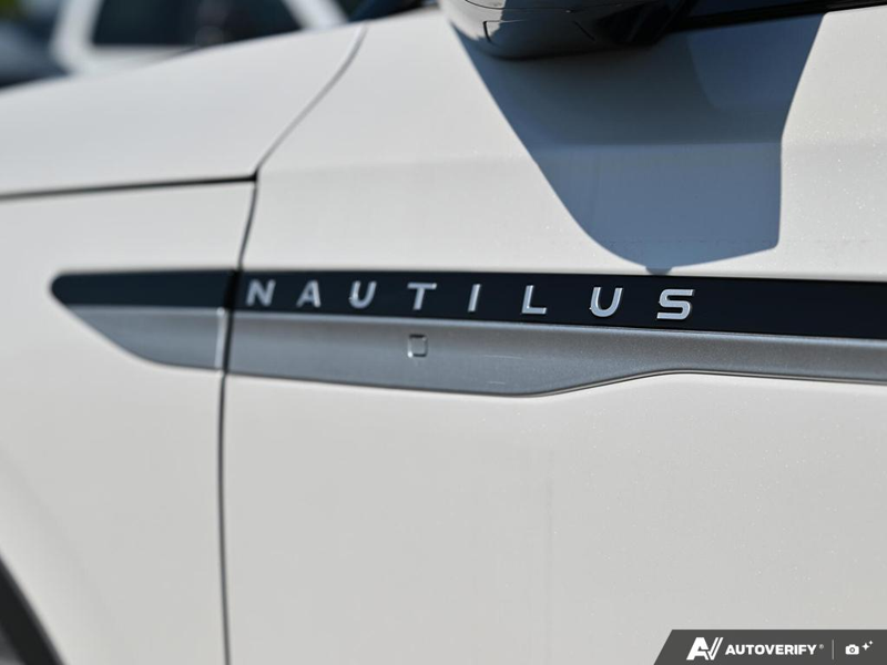 NEW 2026 Lincoln Nautilus Premiere - White Platinum Metallic Tri-coat Exterior / MEDIUM LIGHT SPACE GRAY, LINCOLN SOFT TOUCH HEATED FRONT CAPTAIN Interior - $66,048 - Stock #E60816 - VIN 5LMPJ8JA1TJ058367 - Photo 11