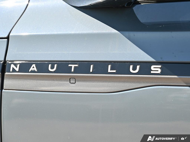 NEW 2026 Lincoln Nautilus Reserve Hybrid - Whisper Blue Metallic Clearcoat Exterior / HOT CHOCOLATE, PREMIUM LEATHER-TRIMMED HEAT/VENT CAPTAIN'S CHAIR Interior - $84,409 - Stock #E61035 - VIN 5LMPJ8K41TJ066803 - Photo 26