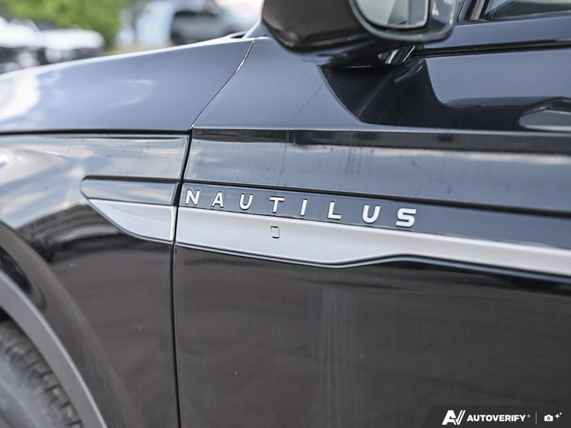 DEMO 2026 Lincoln Nautilus Premiere - Infinite Black Metallic Exterior / MEDIUM LIGHT SPACE GRAY, LINCOLN SOFT TOUCH HEATED FRONT CAPTAIN Interior - $59,334 - Stock #E60737 - VIN 5LMPJ8JA4TJ049694 - Photo 26