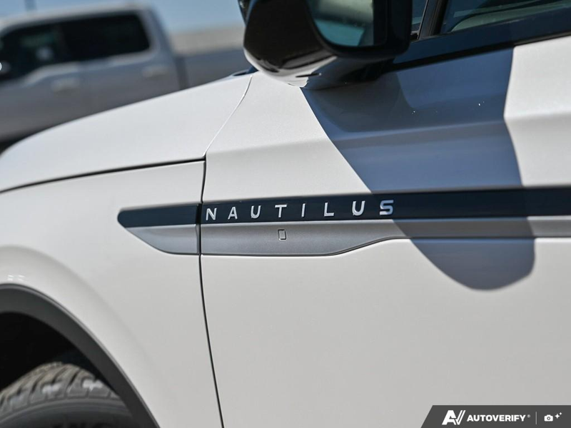 NEW 2026 Lincoln Nautilus Premiere - White Platinum Metallic Tri-coat Exterior / ONYX BLACK, LINCOLN SOFT TOUCH HEATED FRONT CAPTAIN'S CHAIRS Interior - $58,409 - Stock #E60478 - VIN 5LMPJ8JA0TJ038837 - Photo 26