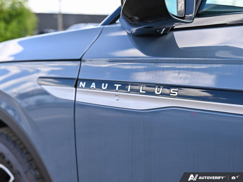 NEW 2026 Lincoln Nautilus Premiere - Whisper Blue Metallic Clearcoat Exterior / ONYX BLACK, LINCOLN SOFT TOUCH HEATED FRONT CAPTAIN'S CHAIRS Interior - $67,184 - Stock #E60726 - VIN 5LMPJ8JA9TJ049688 - Photo 27